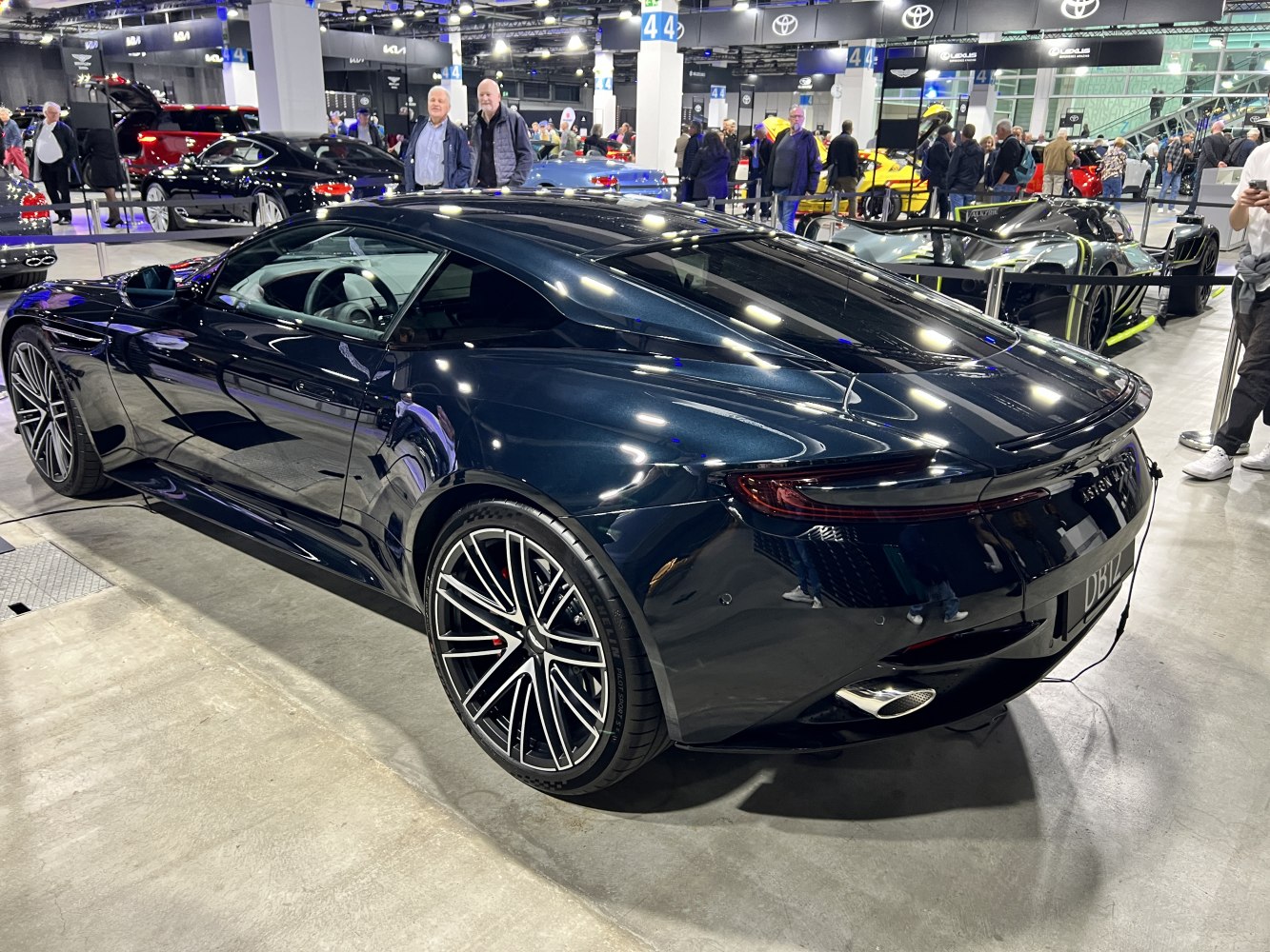 Rear and side view of sleek coupe with alloy wheels