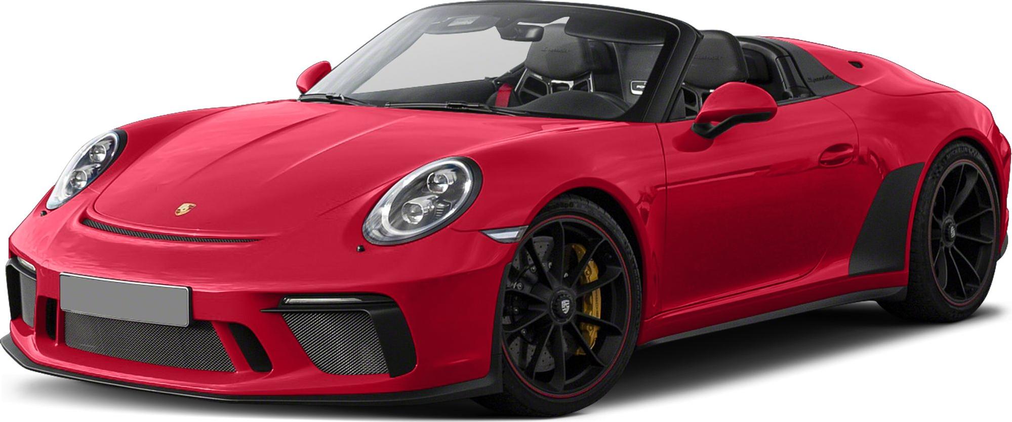 Front view of an open roof roadster with black alloy wheels and carbon fiber accents