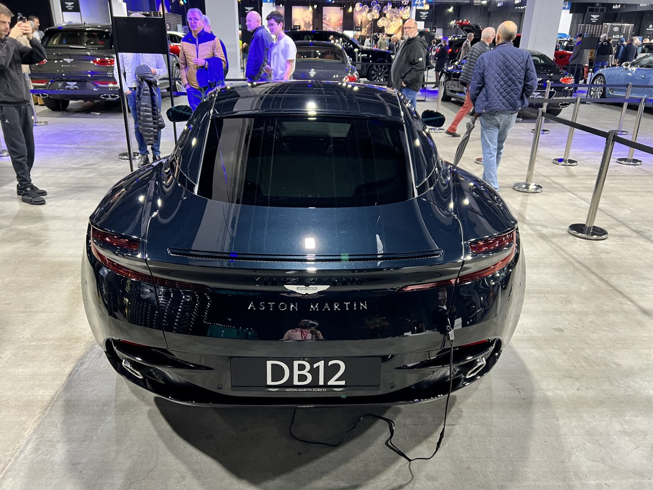 Sleek rear with elongated taillights and glossy black finish