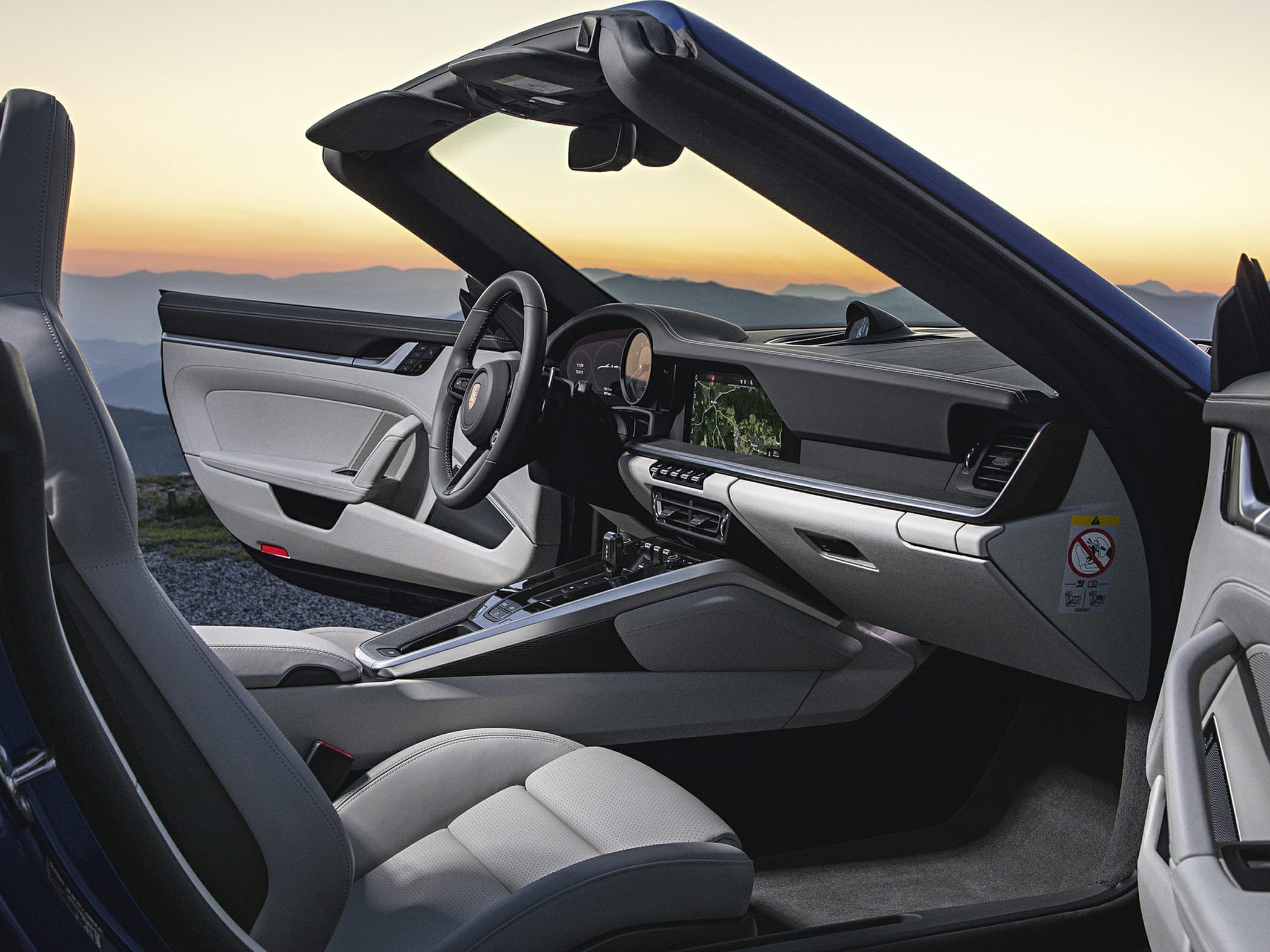 Luxury convertible cockpit with modern dashboard and premium interior design