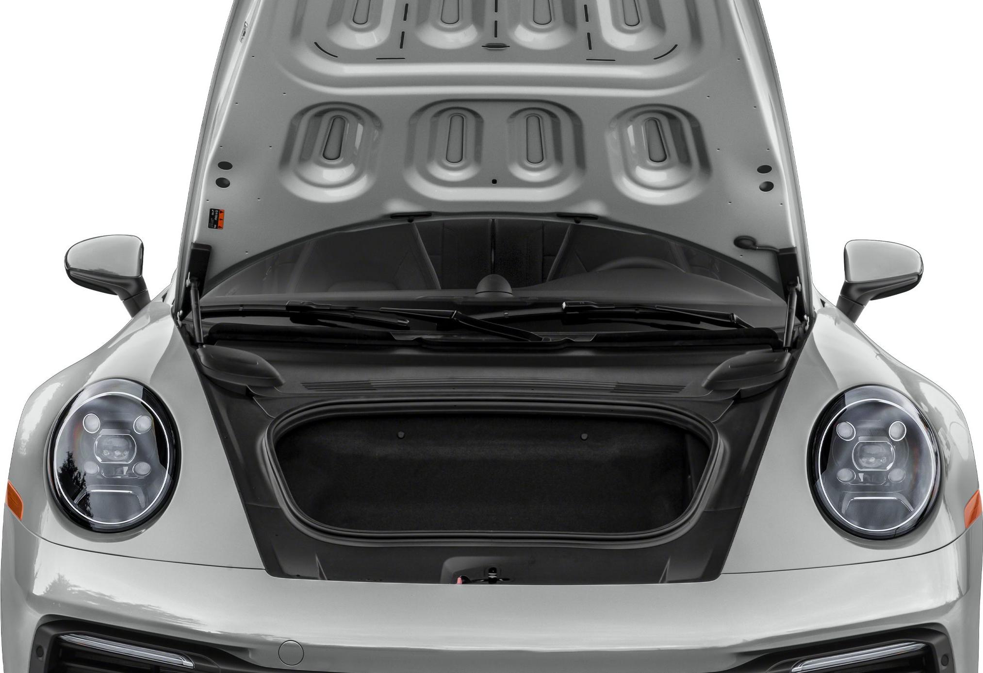 Front trunk open with headlight and hood interior visible