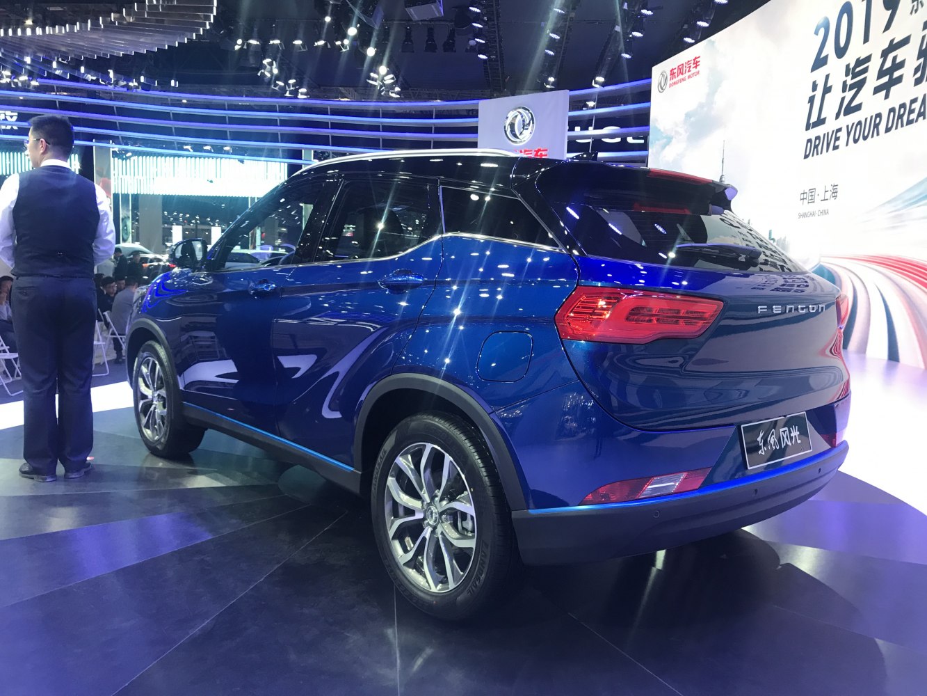 Rear and side view of a blue modern SUV with alloy wheels and LED tail lights
