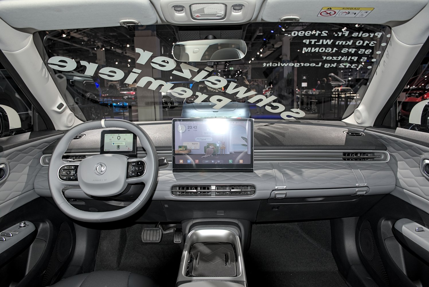 Modern digital dashboard and quilted door panels interior