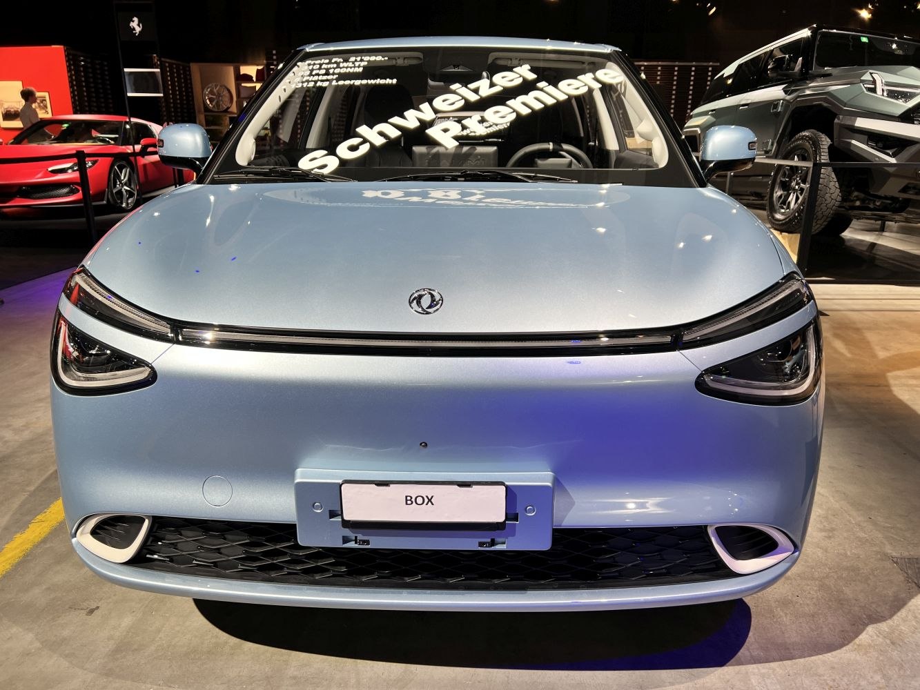 Front view with sleek headlights and minimalist grille design