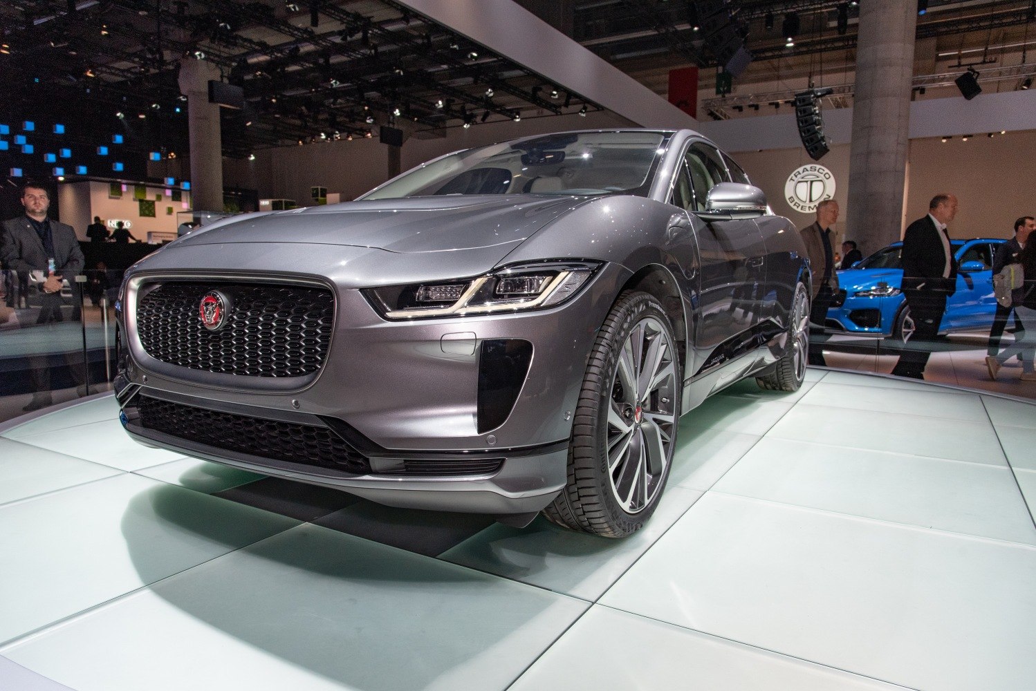Front view with LED headlights, grille, and alloy wheels