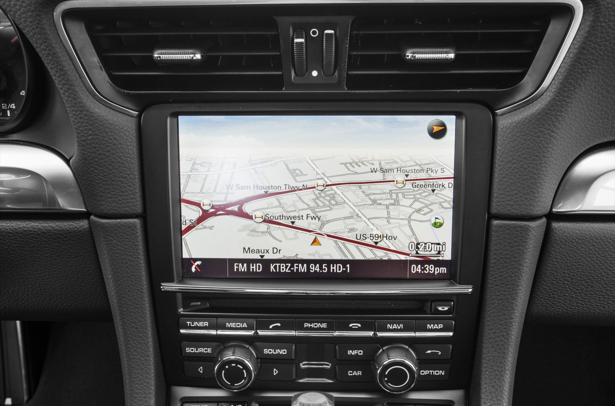 Car navigation and infotainment system with dashboard controls