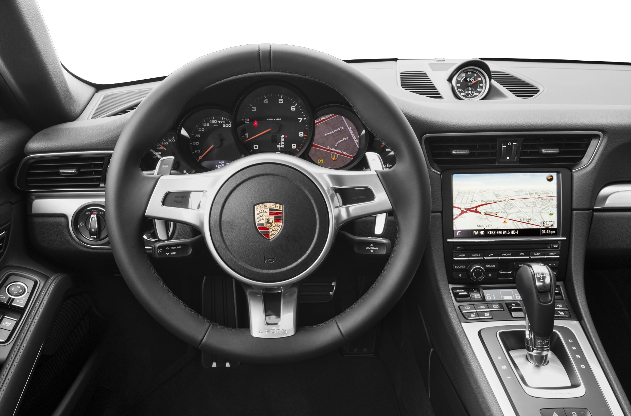 Steering wheel, instrument cluster, and navigation display in luxury car interior