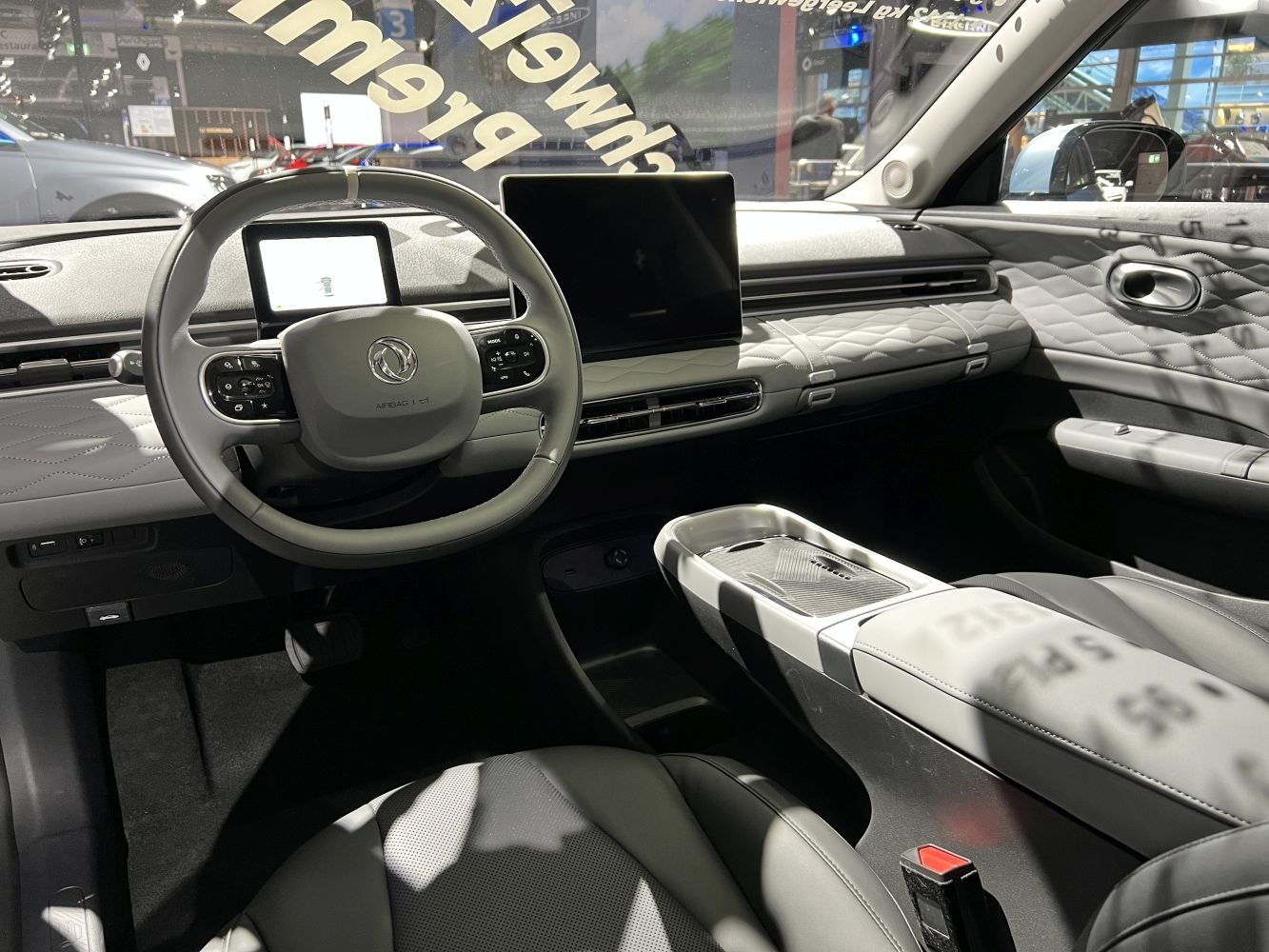 Modern dashboard and steering wheel with digital displays
