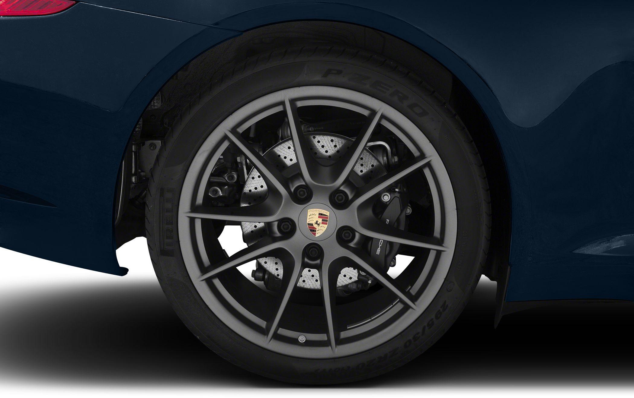 Multi-spoke alloy wheel with ventilated brake disc and caliper