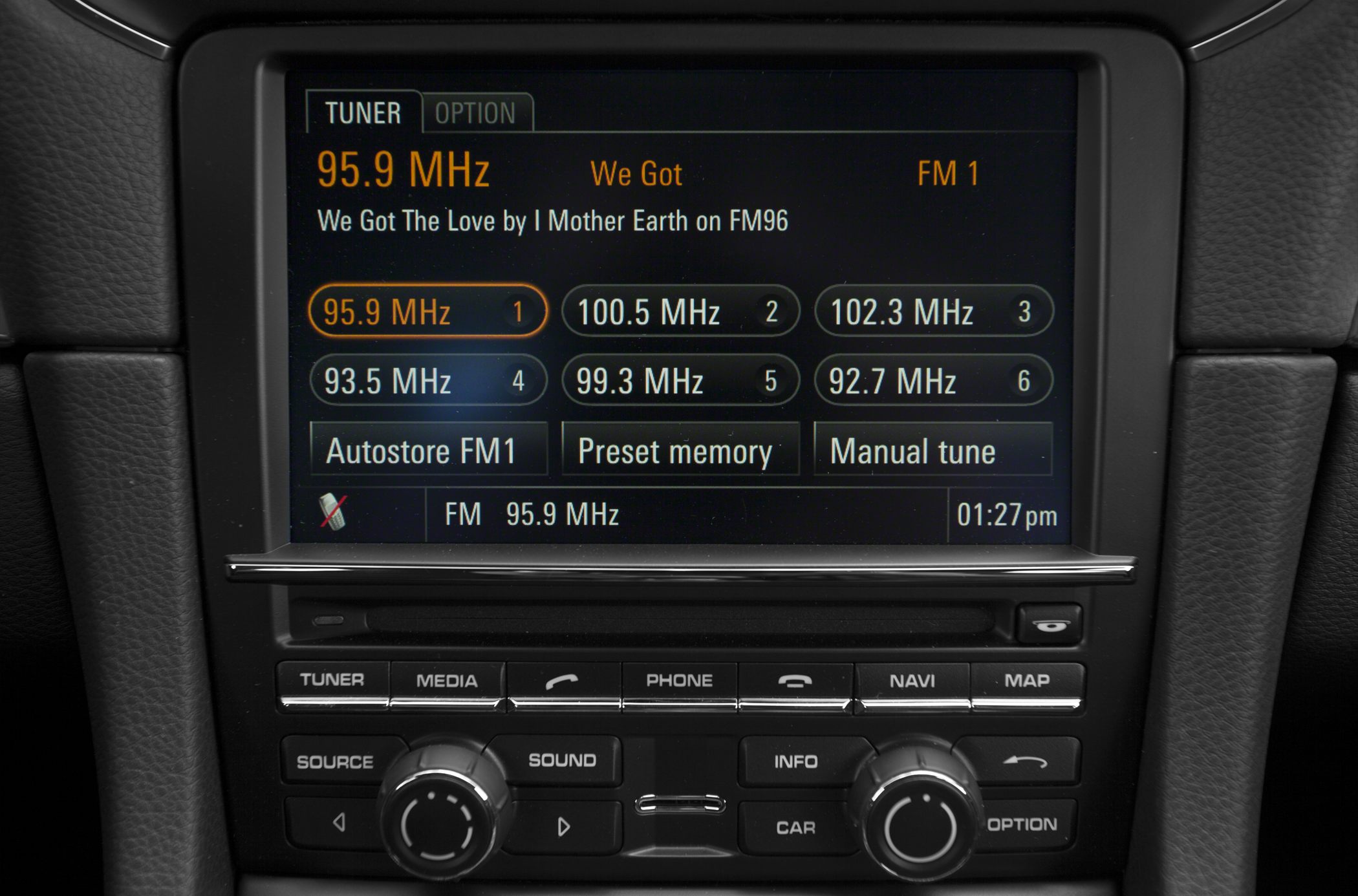 In-dash infotainment radio and navigation system display with control buttons