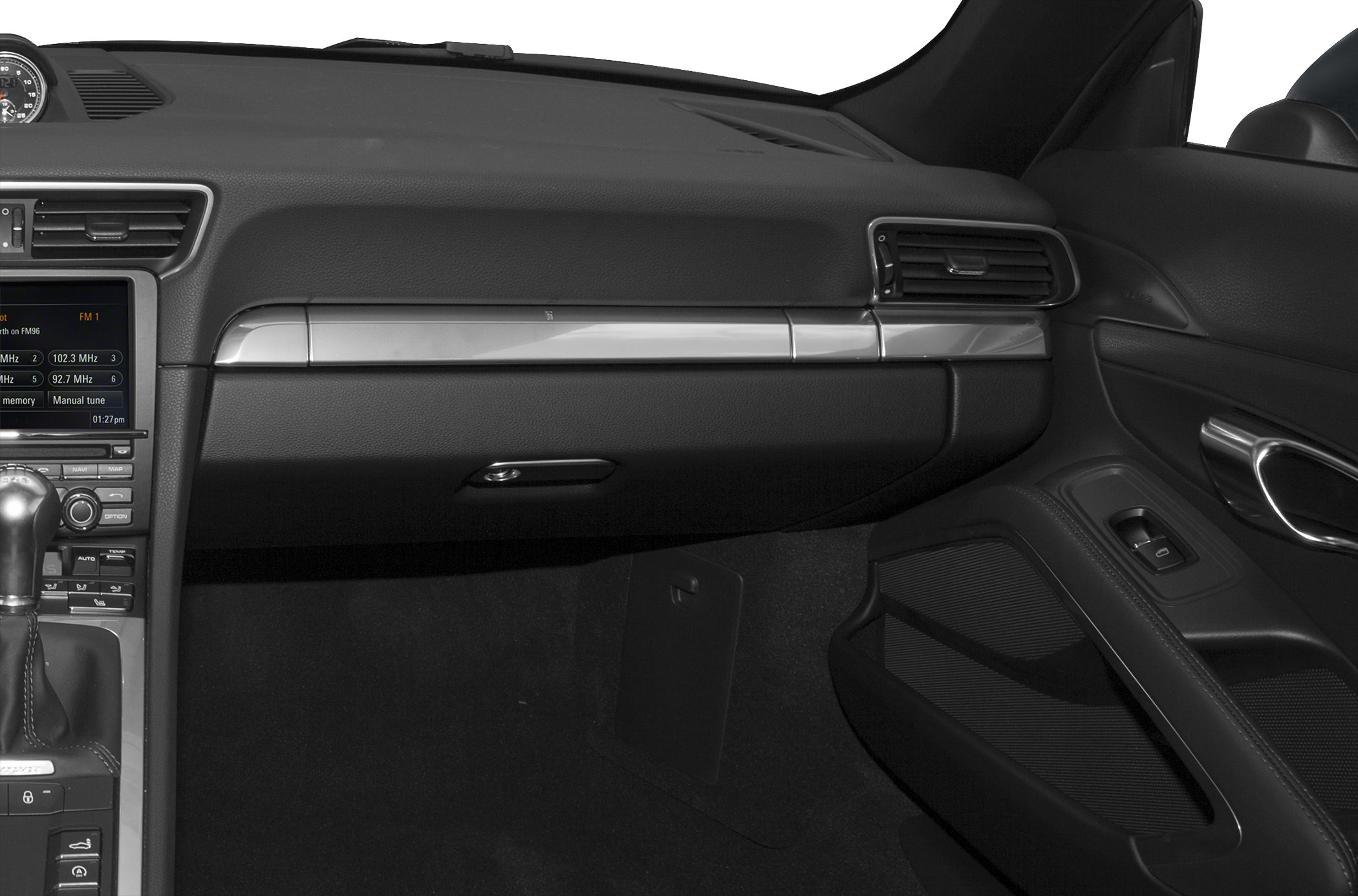 Close-up of elegant dashboard and center console with gear shifter.
