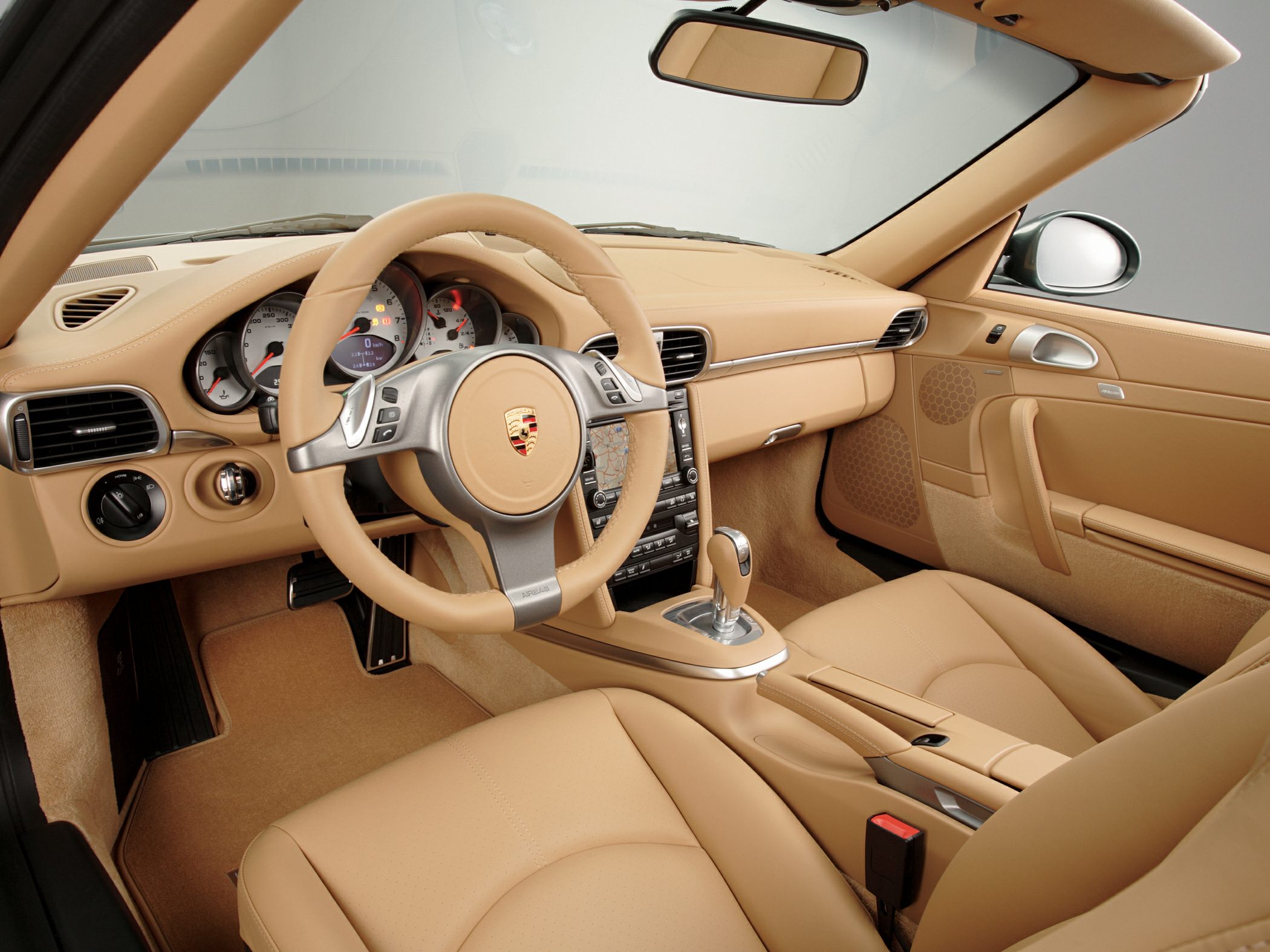 Beige leather interior with dashboard and steering wheel