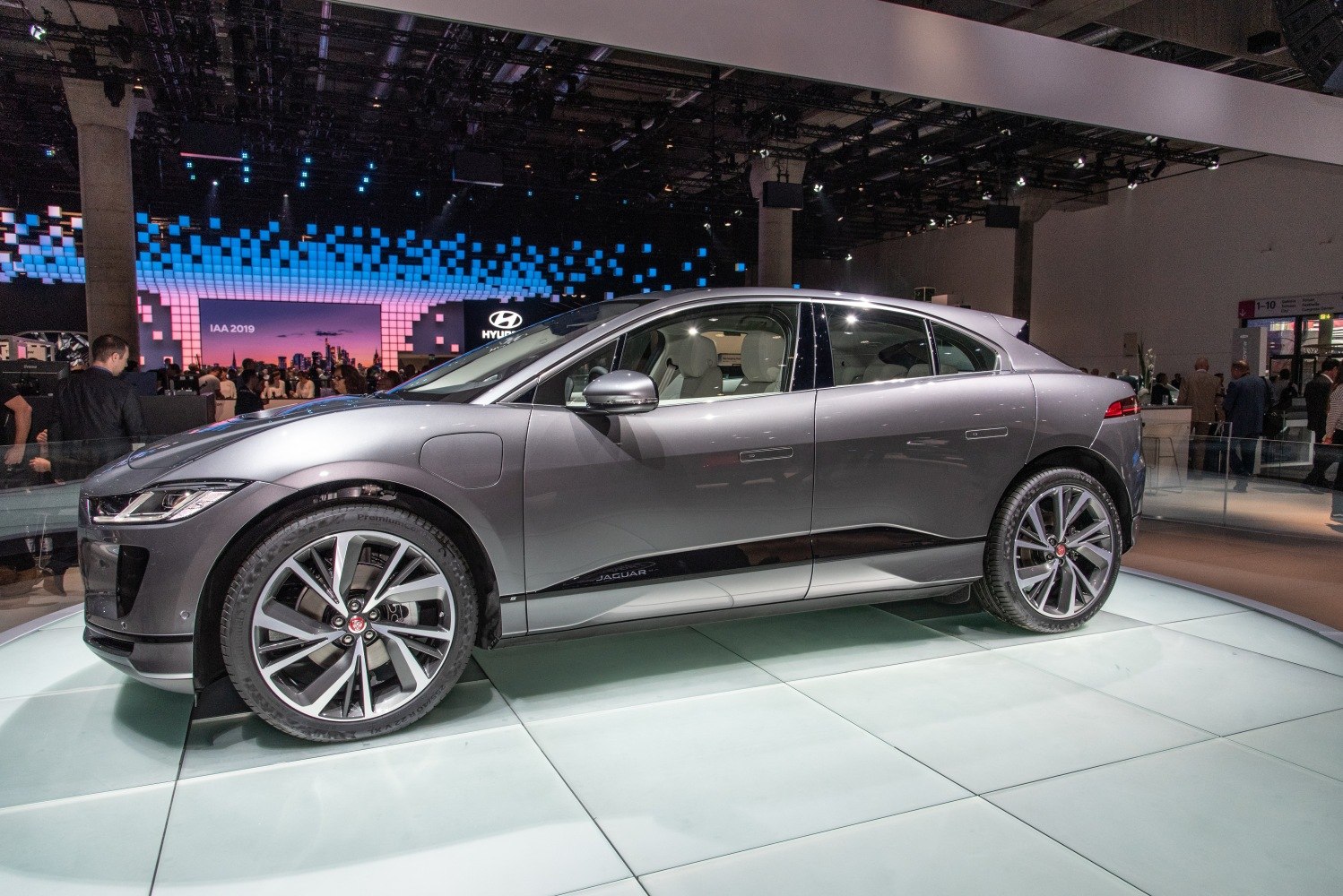 Electric SUV side profile with sleek aerodynamic design and large alloy wheels