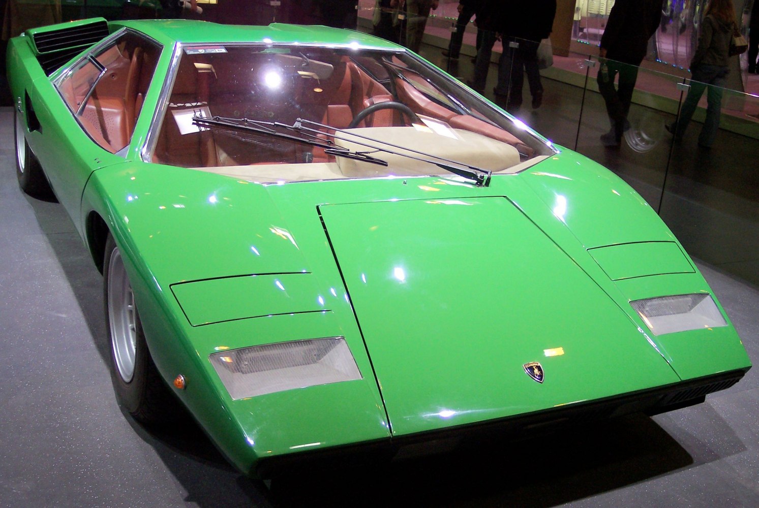 Angular front end with pop-up headlights in bright green