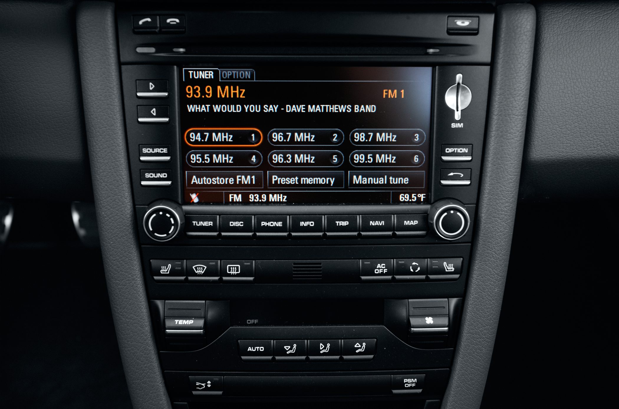 Center console with radio tuner and climate controls