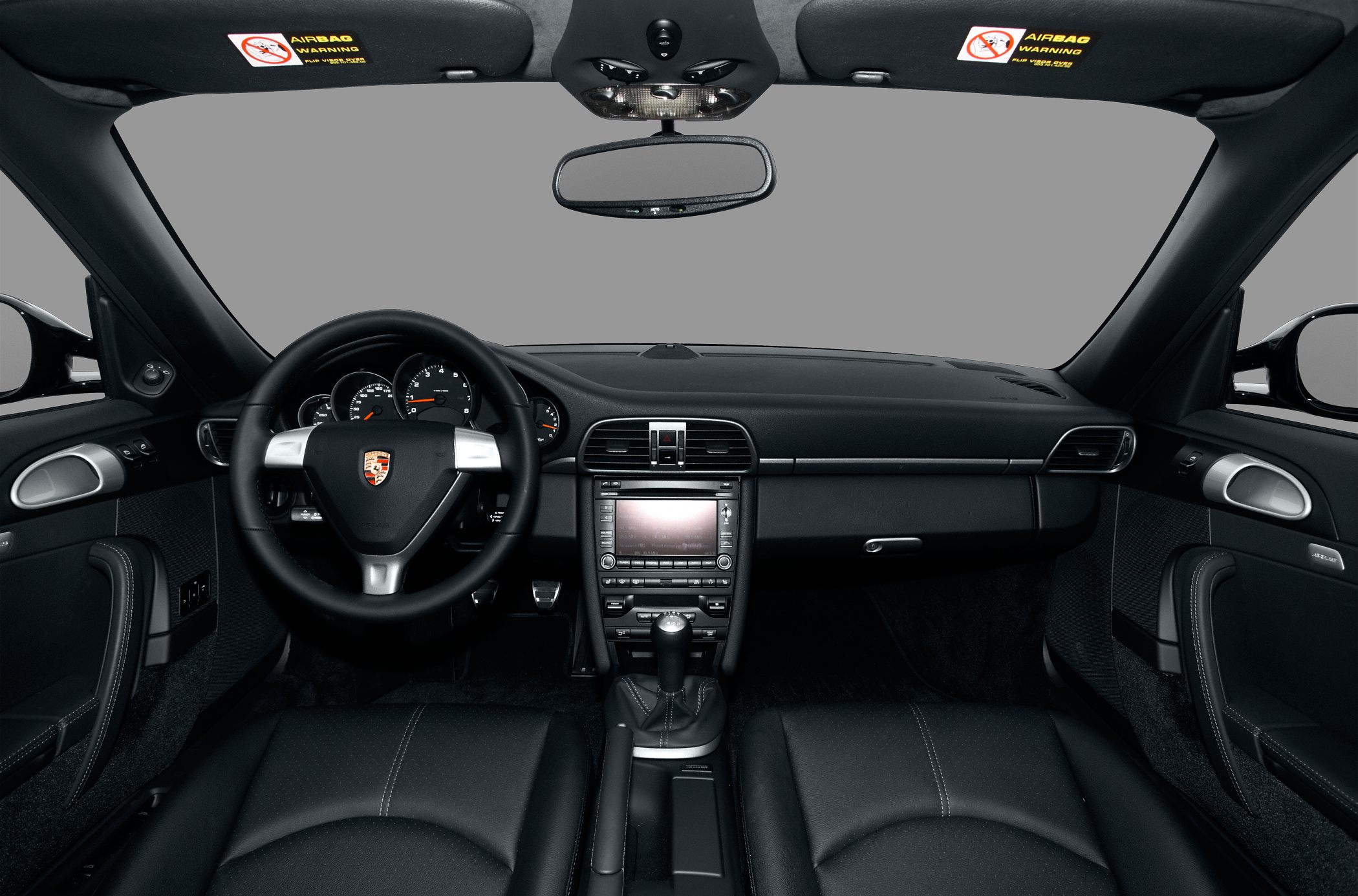 Dashboard and steering wheel with manual gearshift in black luxury interior