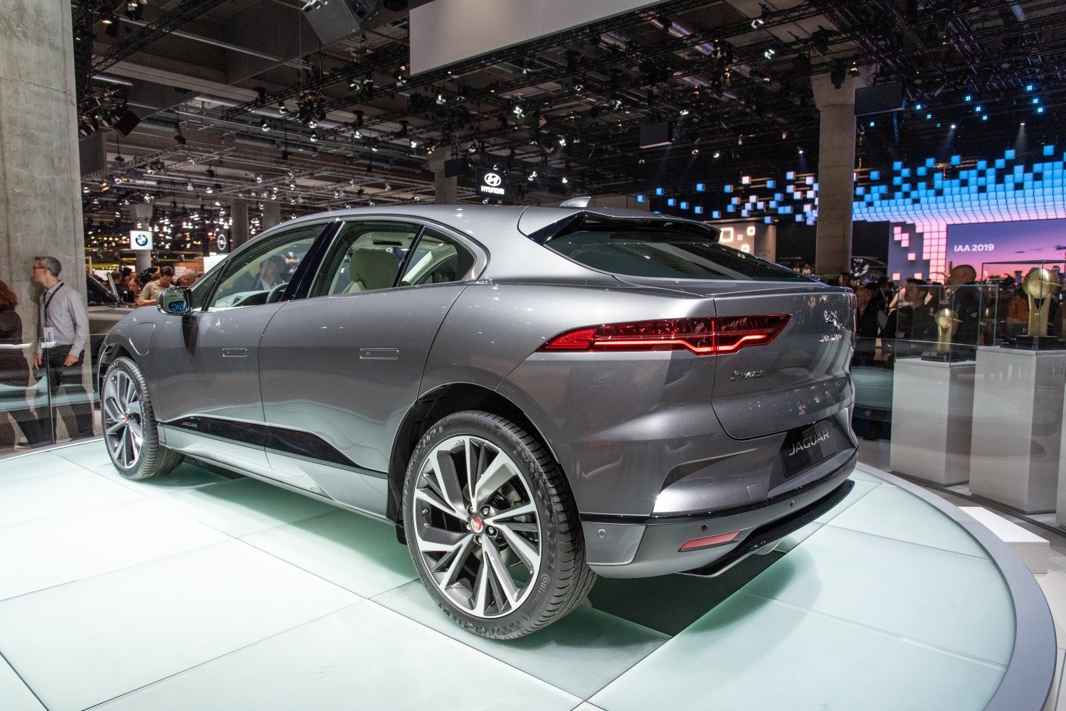 Rear three-quarter view of an electric SUV with LED taillights and alloy wheels