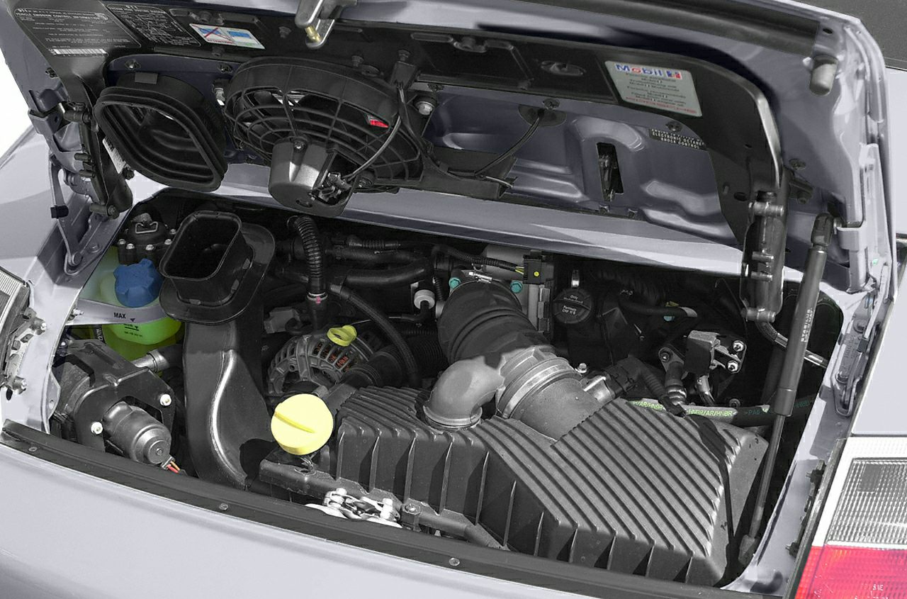 Engine compartment with air intake and mechanical components