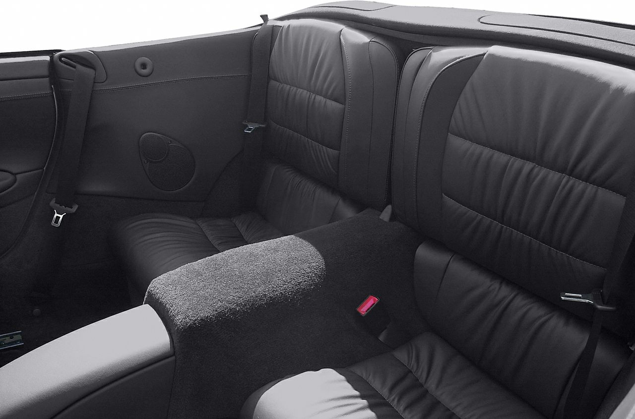 Black leather rear seats with integrated seat belts and speaker