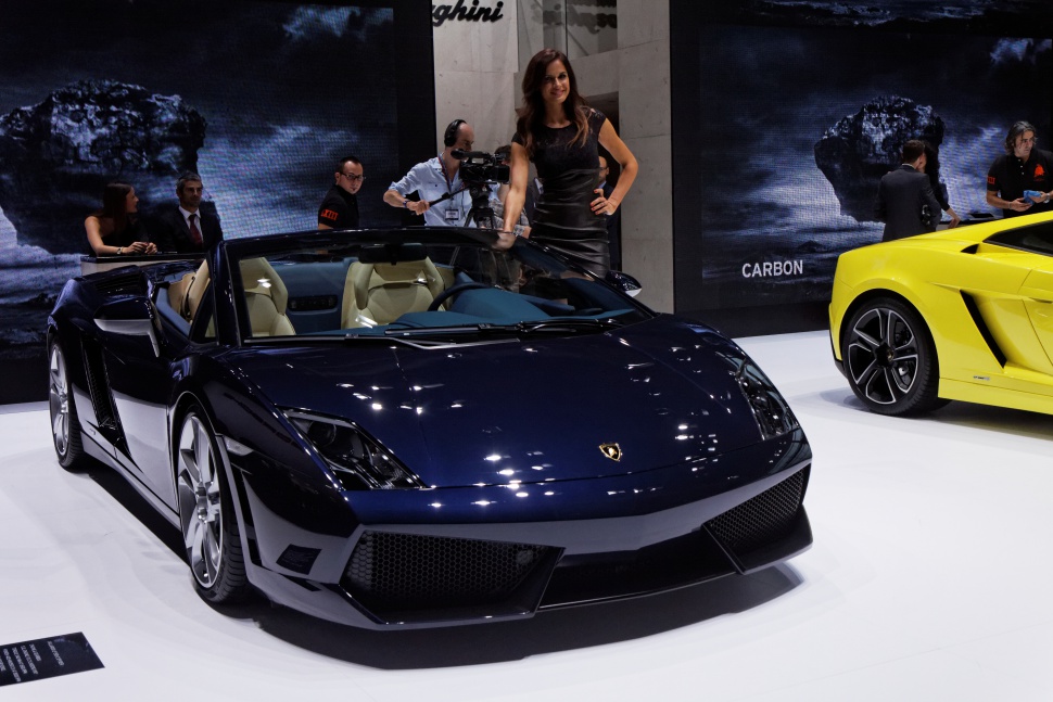 Convertible sports car with sleek front design and blue exterior