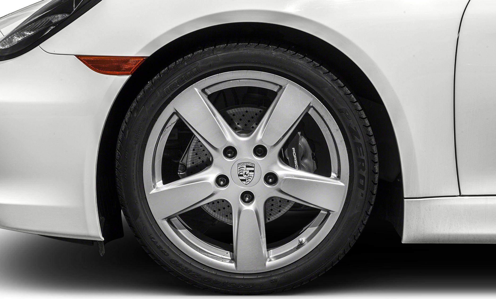 Close-up of alloy wheel with perforated brake disc and Pirelli tire