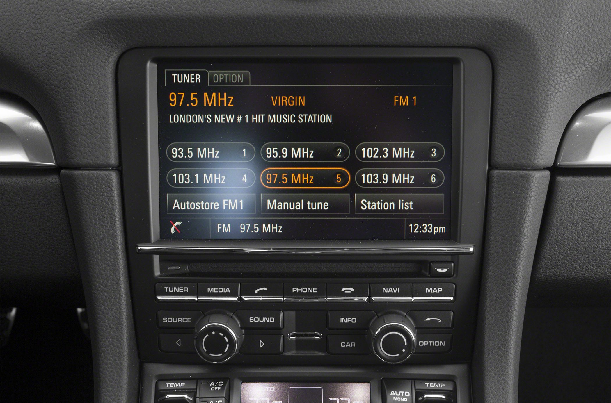 Car infotainment screen showing FM radio tuner and controls