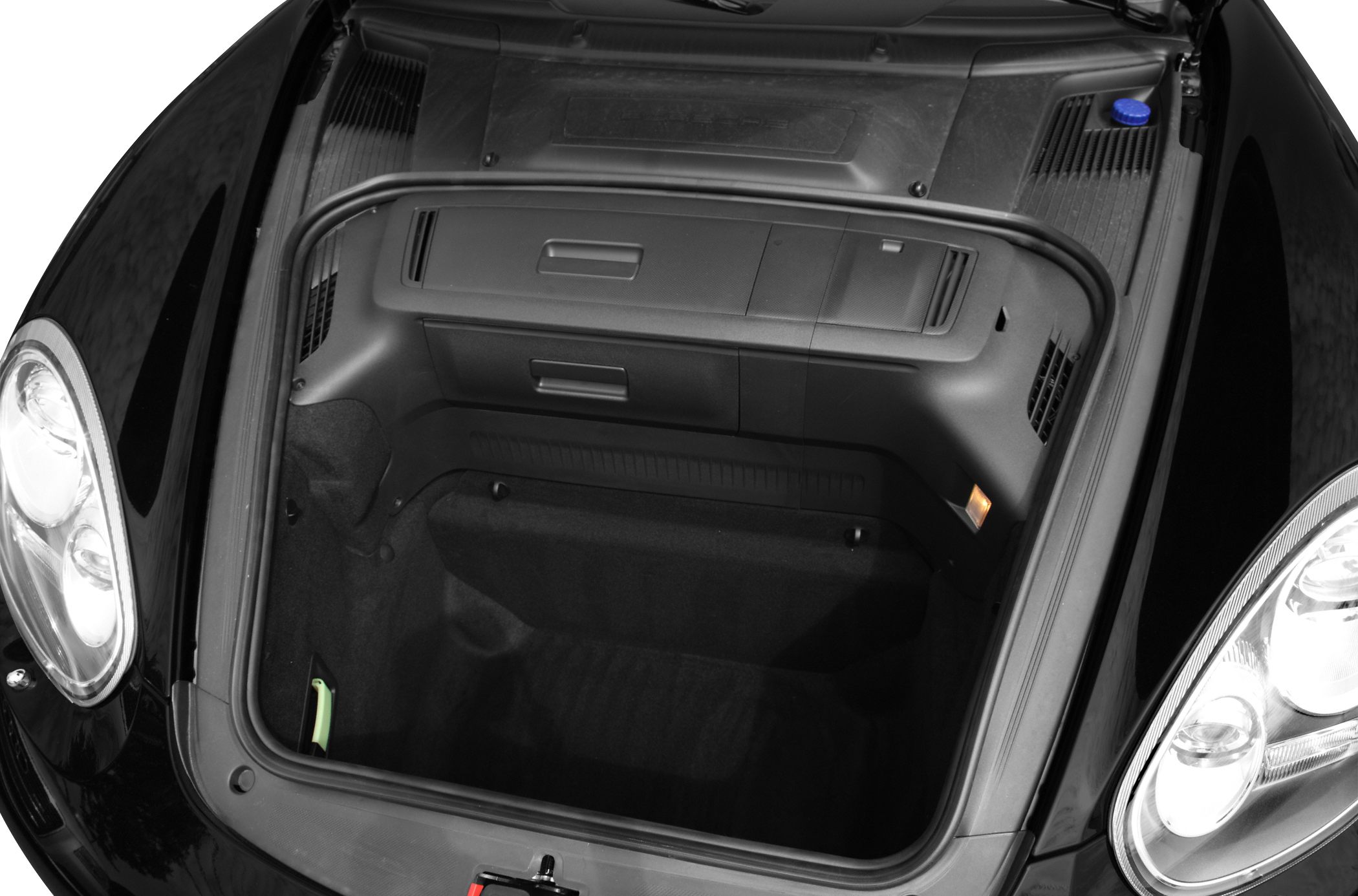 Front trunk storage compartment with lighting and detailed interior design