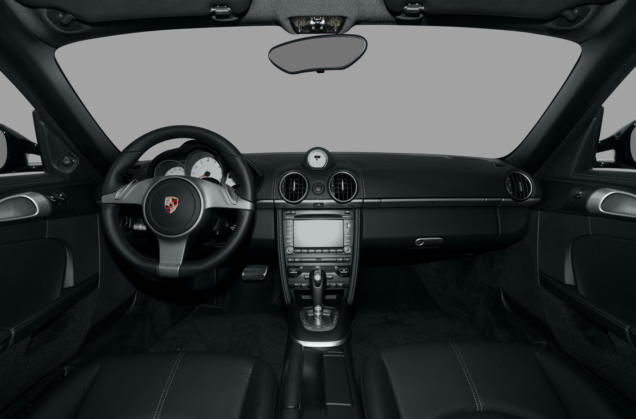 Steering wheel, dashboard, center console with analog clock and touchscreen