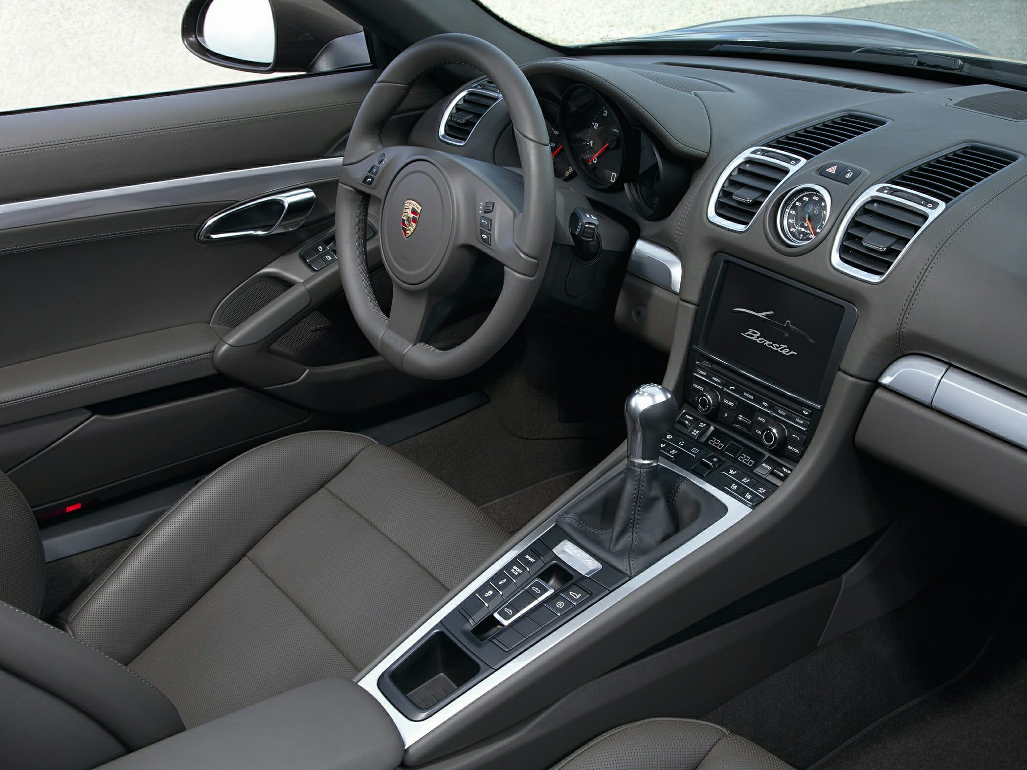Manual gearshift, digital display, luxury interior trim