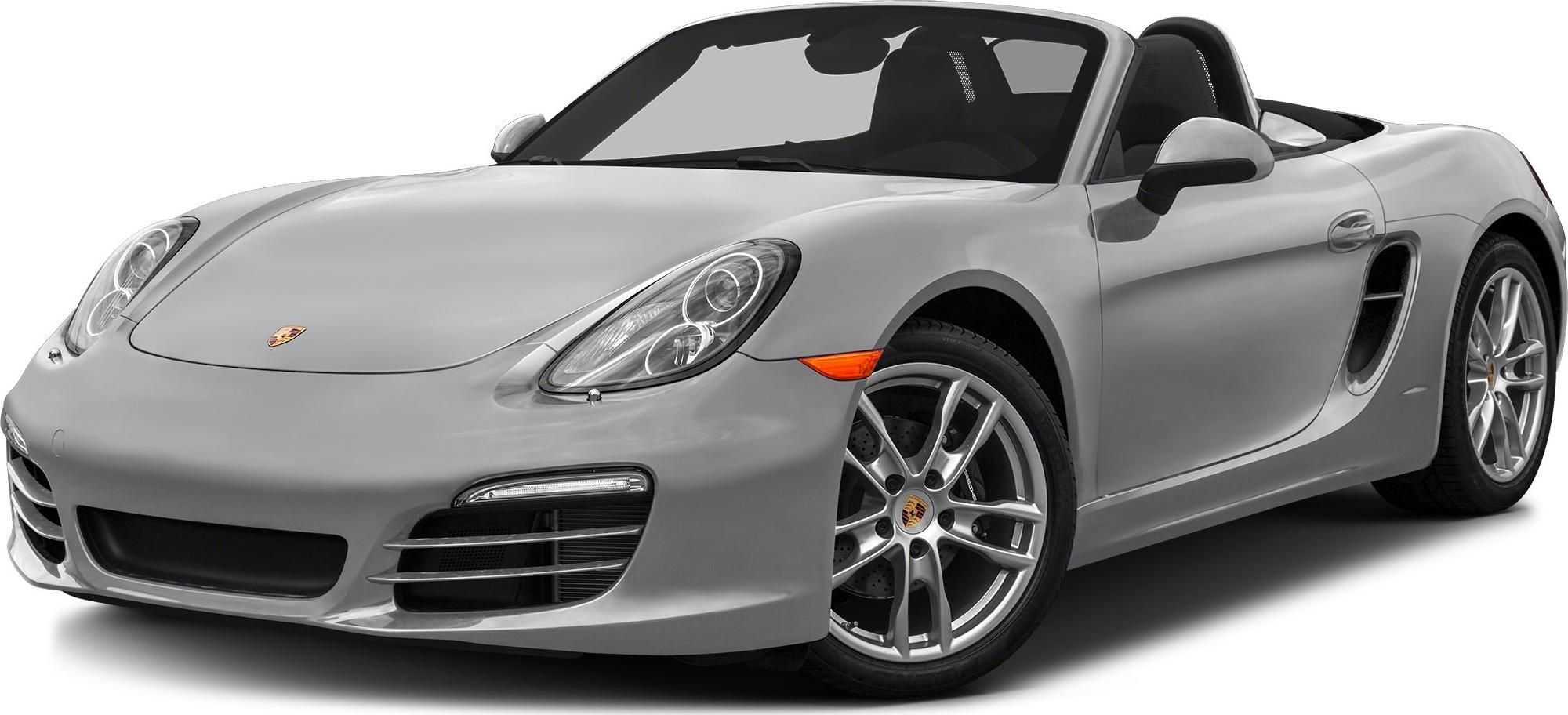Silver convertible with aerodynamic body, projector headlights, alloy wheels, and side air intakes.