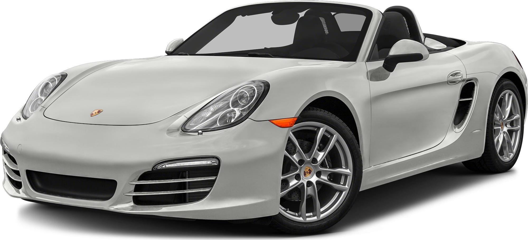 Convertible sports car front close-up with sharp headlights and alloy wheels.