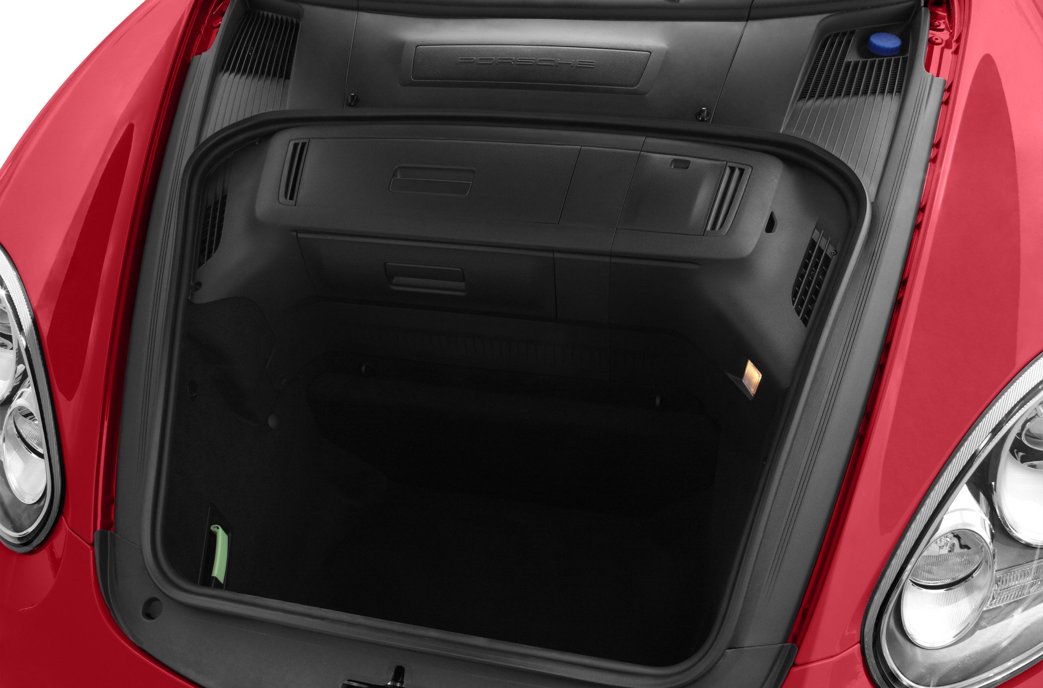 Front trunk (frunk) storage space with storage compartments and lighting.