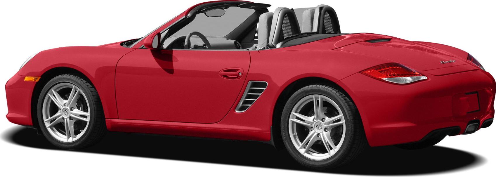 Red convertible sports car with open roof and silver alloy wheels