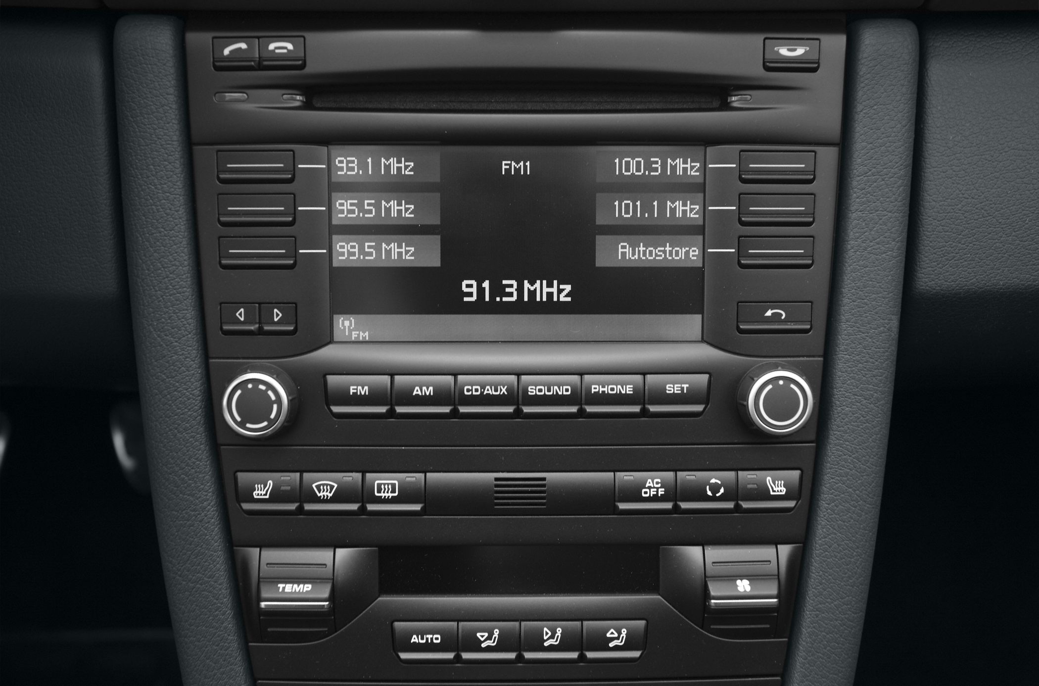 Radio and climate control panel with FM tuner and temperature controls