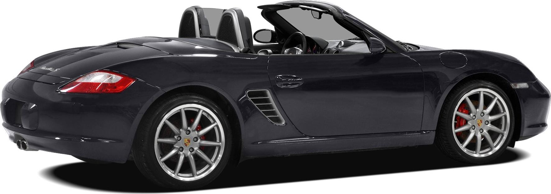 Convertible sports car side profile with rear air vents and alloy wheels.