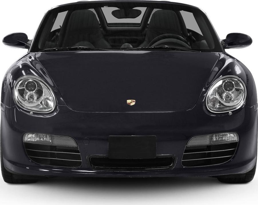 Close front view with distinctive headlights and smooth hood.