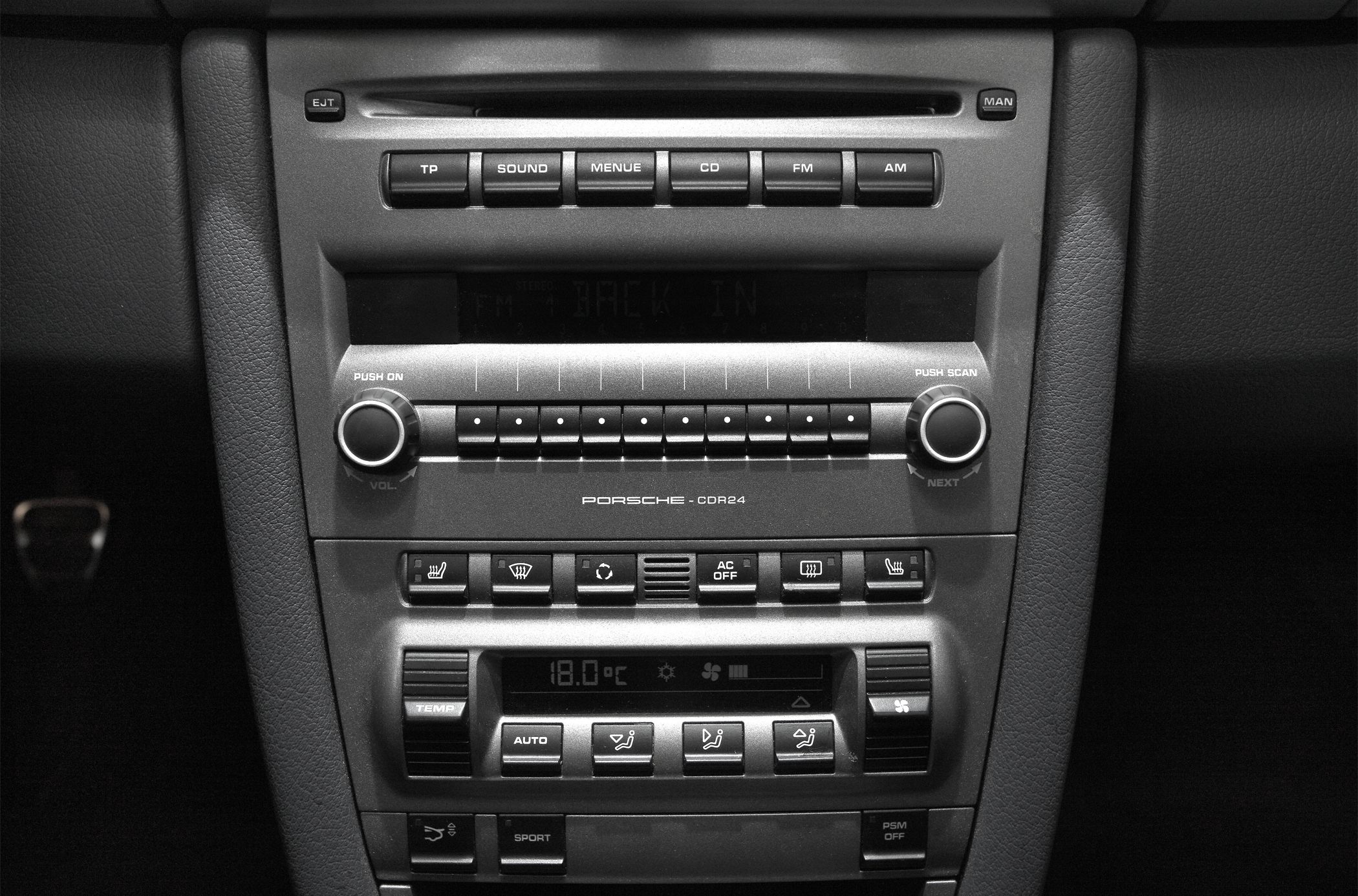 Center console with CDR24 audio system and climate control buttons