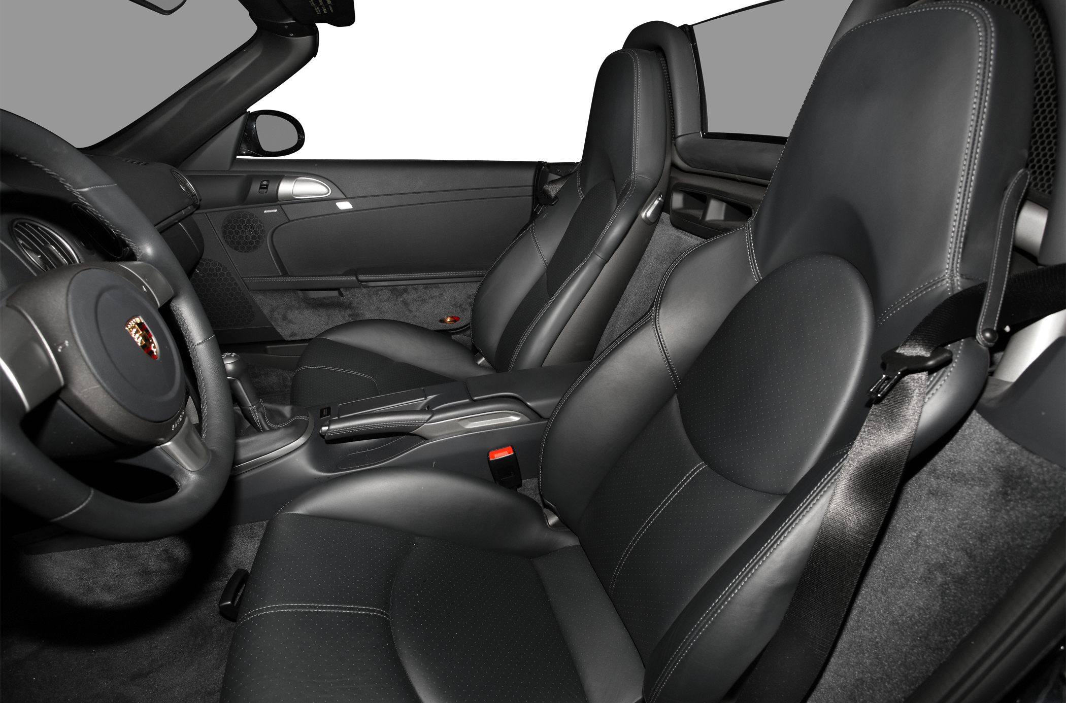 Black leather seats and sporty dashboard interior