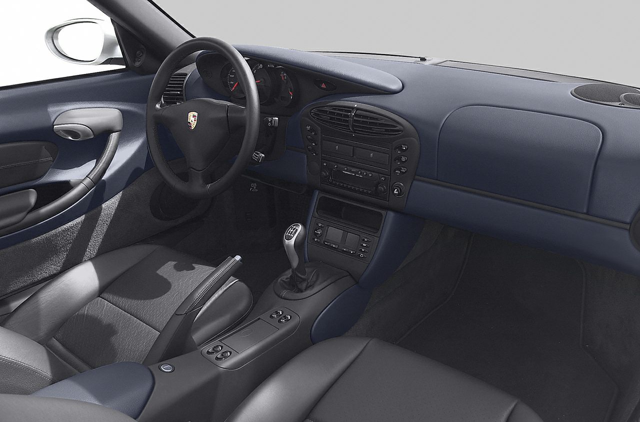 Dashboard, steering wheel, manual gear stick, center console interior