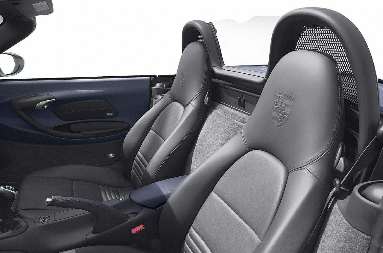 Black leather sport seats and interior of a convertible with manual handbrake and gearshift