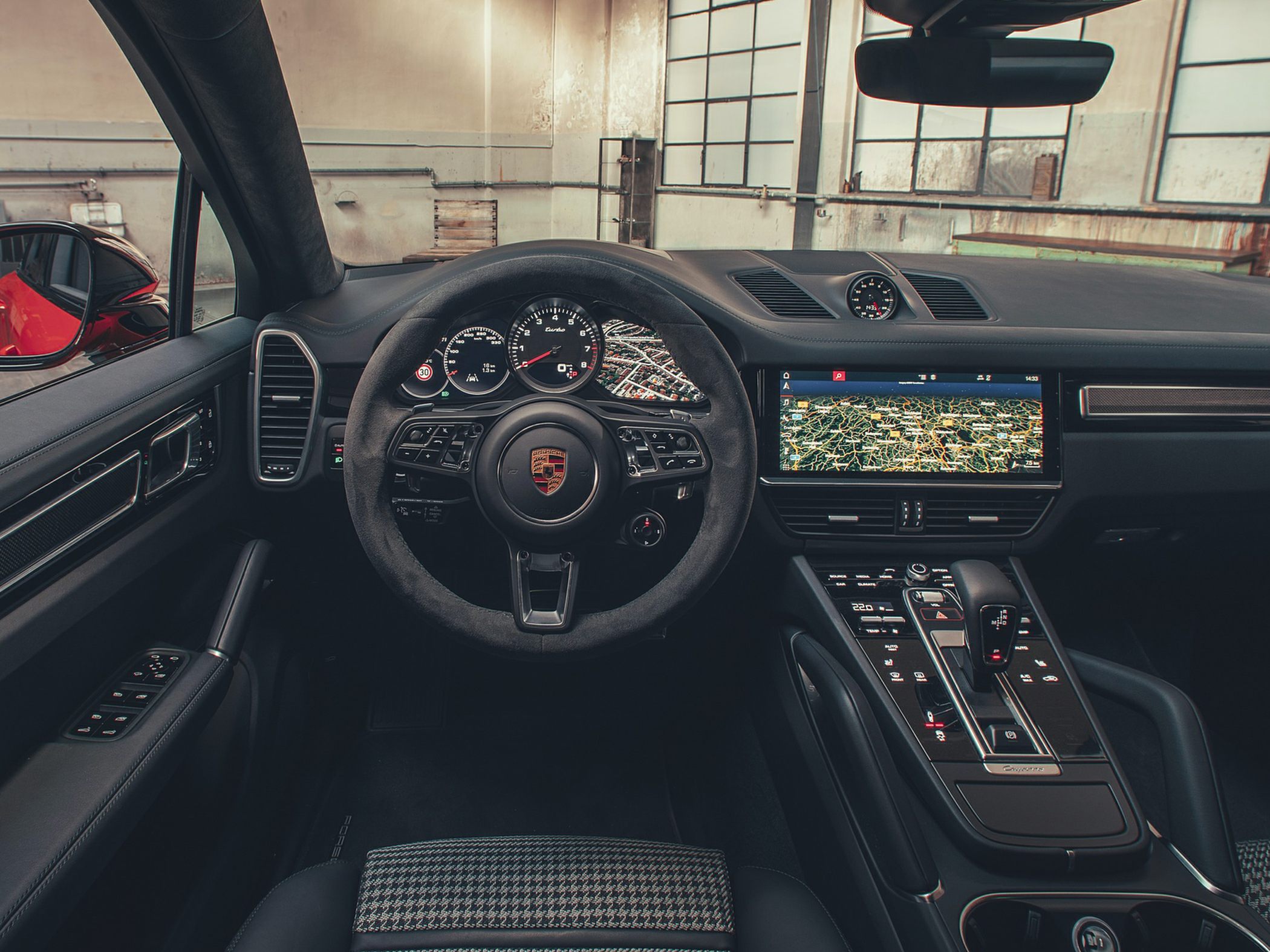 Digital dashboard and infotainment system with sporty steering wheel and central console