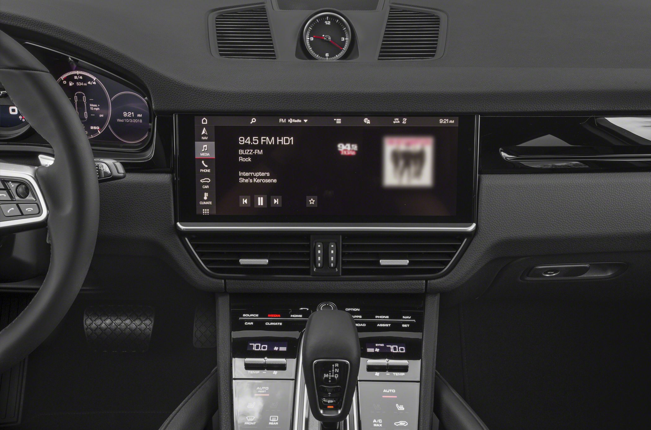 Luxury SUV dashboard with digital infotainment and climate control