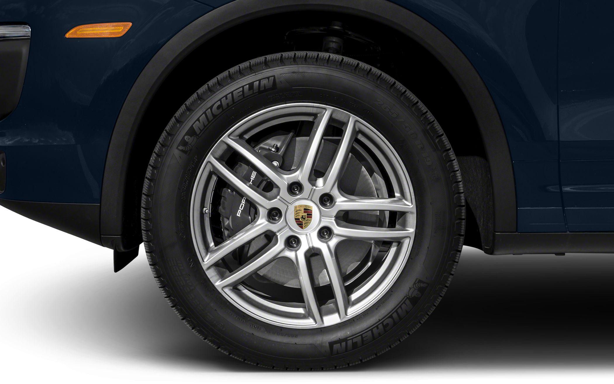 Close-up of alloy wheel and Michelin tire with brake disc