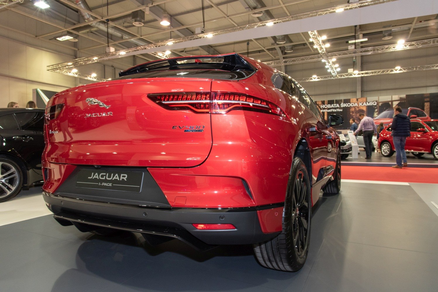 Rear view of electric SUV with sleek LED taillights and black alloy wheels
