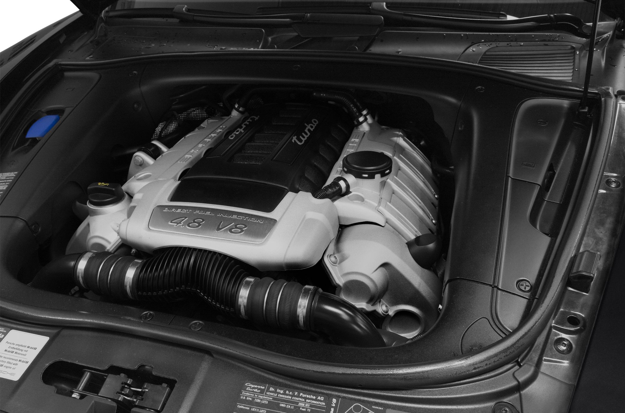 Detailed close-up of a turbocharged 4.8 V8 engine with direct fuel injection
