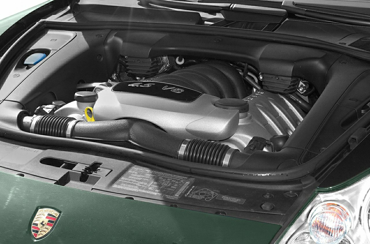 V8 engine bay layout with intake manifold and various engine components