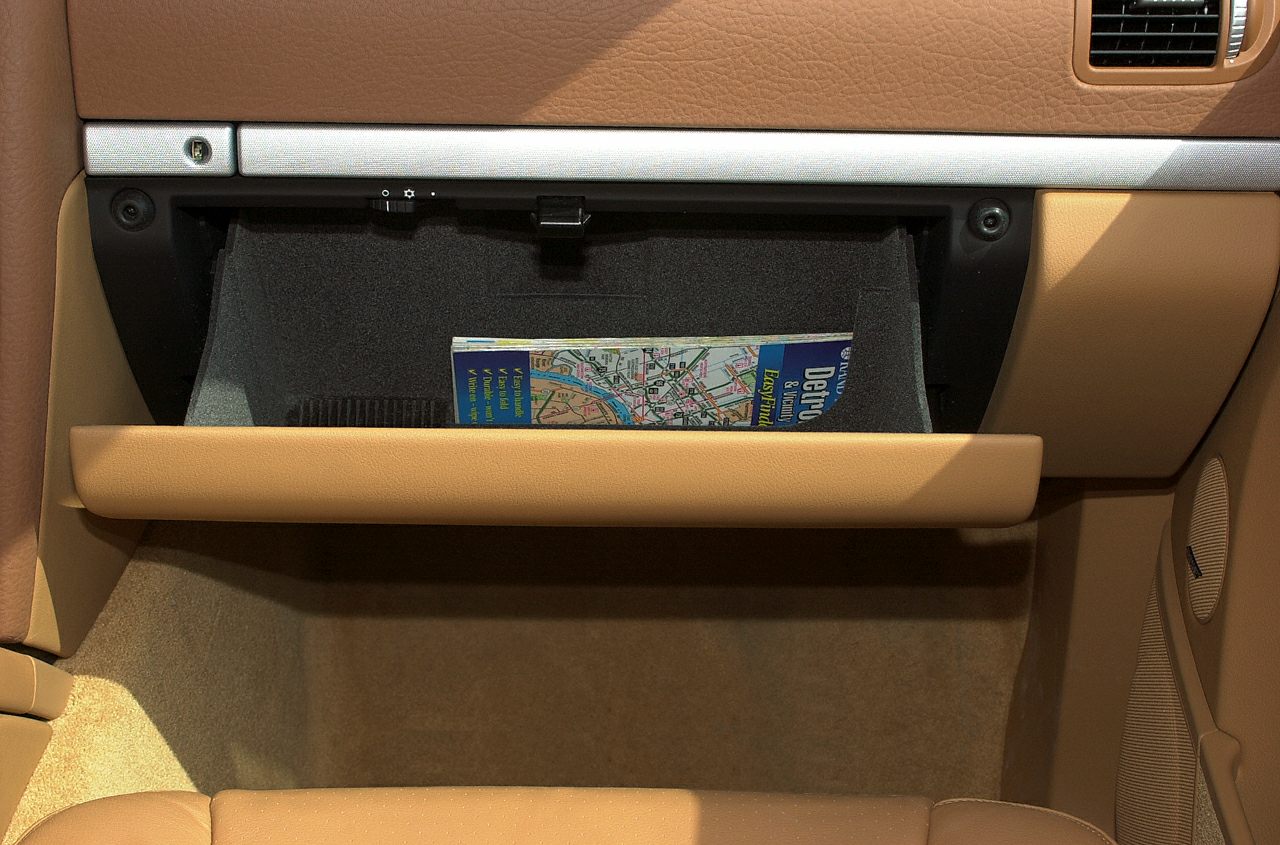 Glove compartment with map storage in tan leather interior