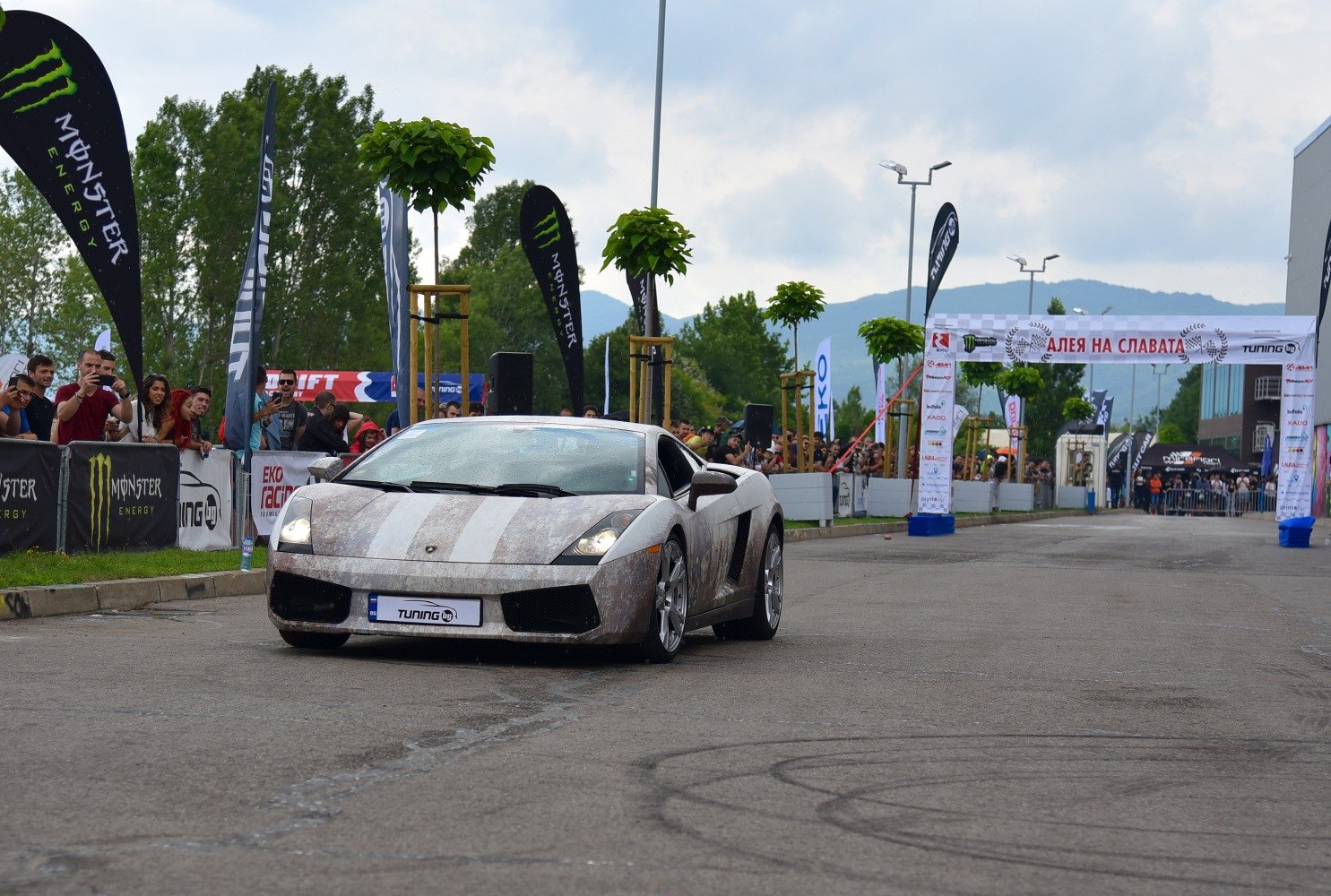 Front view of a Lamborghini Gallardo Coupe with racing livery at an event