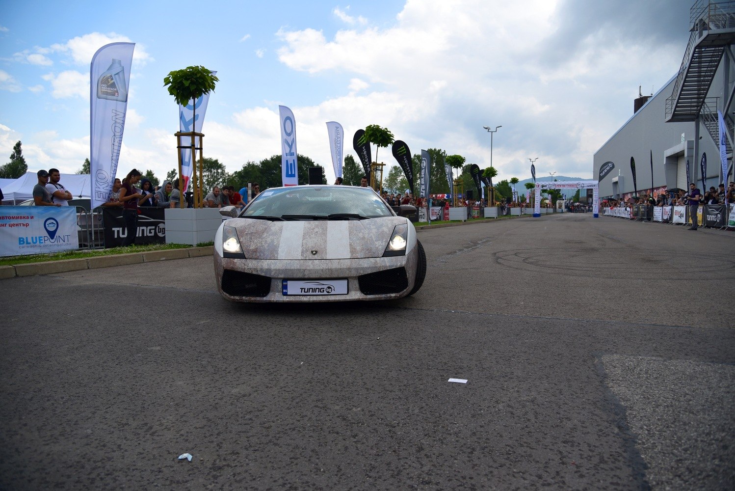 Front view of a sports car with striking headlights and custom exterior finish