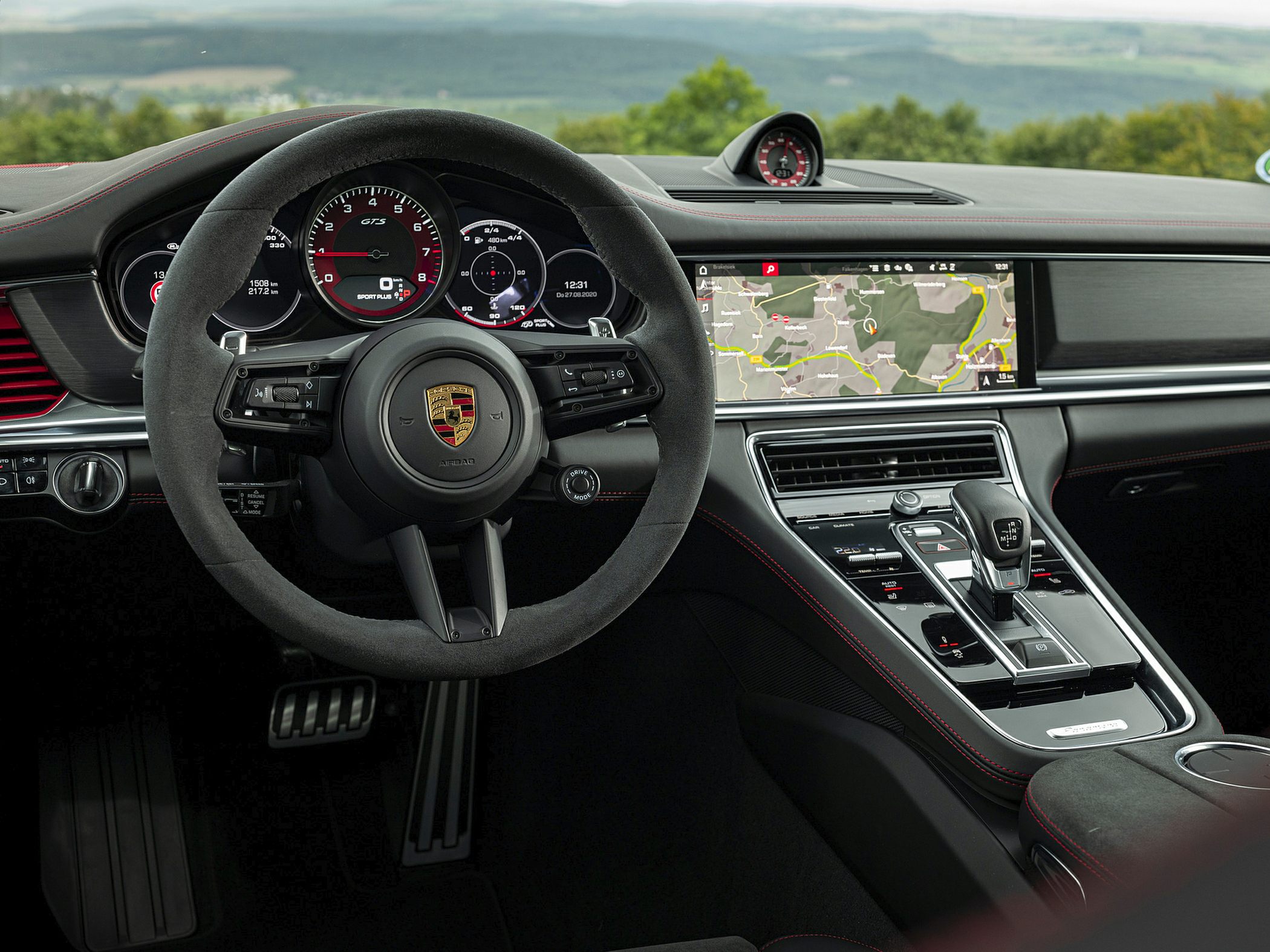 Sport steering wheel and advanced center console with touchscreen GPS